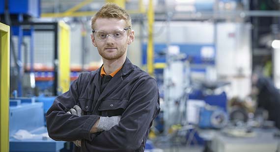 Image from #NoStigma campaign showing a mechanic in his workplace
