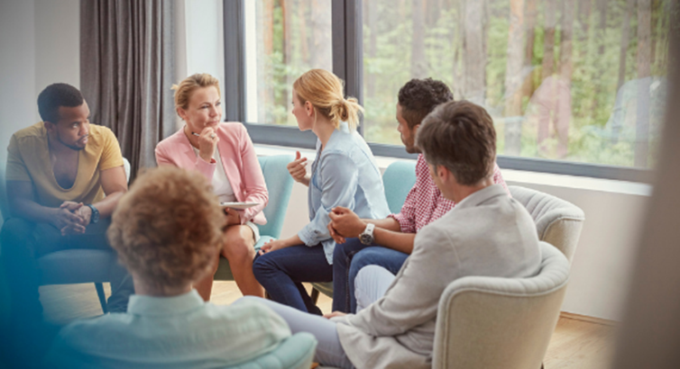 A group therapy session under way