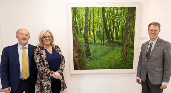 Left to right: Chief Executive Officer of St Patrick's, artist Geraldine O'Reilly Hynes, and Dr Conor Farren of St Patrick's in front of Geraldine's painting, Being There, at the ceremony to announce it as winner of Favourite Painting 2023.